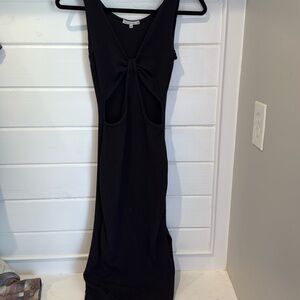 Women’s XS black midi dress with side cut outs and a small slit in the leg